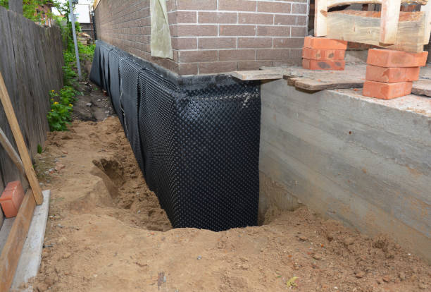 SJ Waterproofing Pros technician performing targeted Emergency Waterproofing assessment in Fairburn, GA